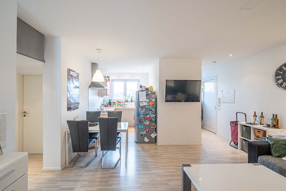 Offener Wohn- und Essbereich mit offenem Zugang zur Küche- Ihr Immobilienmakler KRAN IMMO in Paderborn